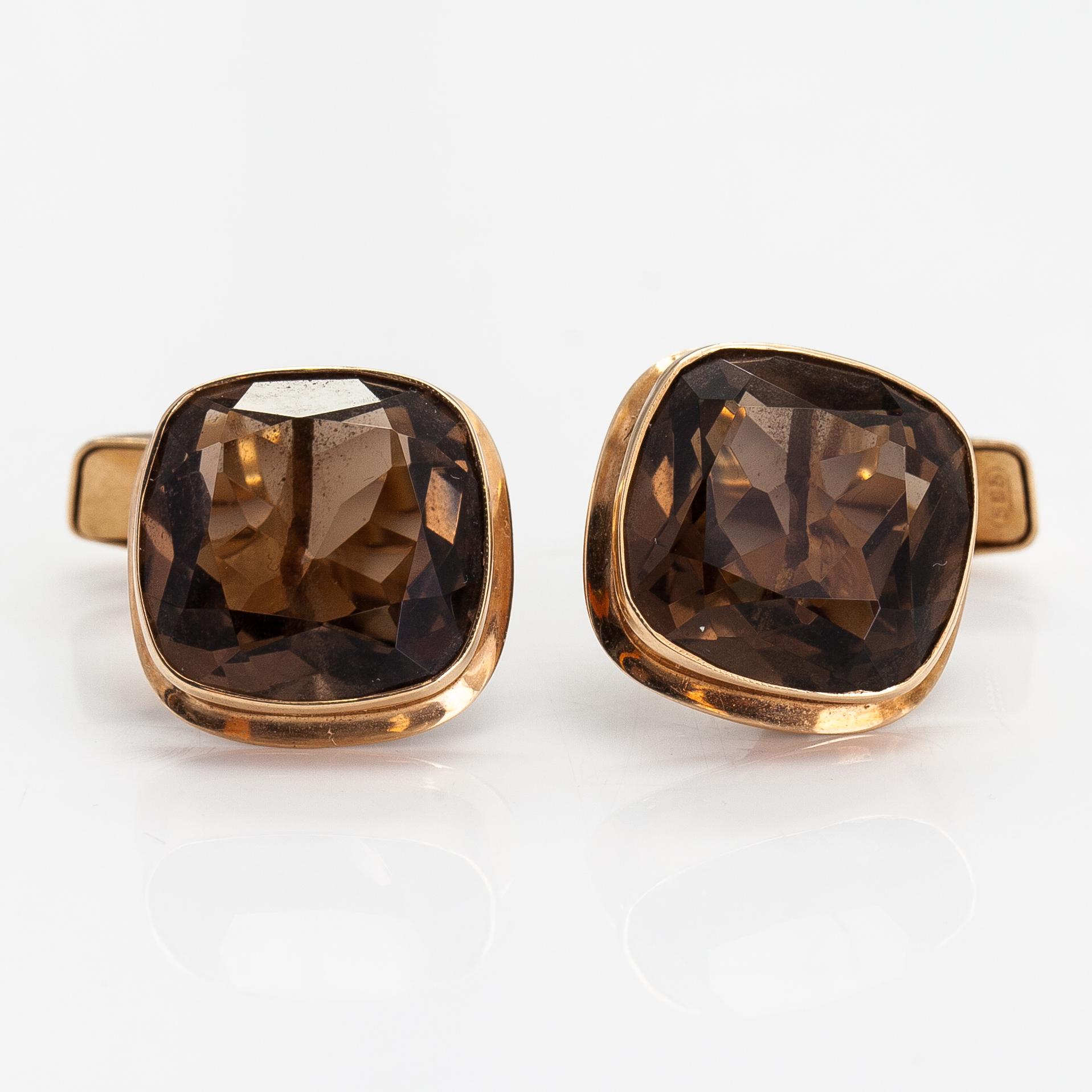 Manschettknappar, 14K guld och rökkvarts. Alppikulta, Helsingfors 1964.