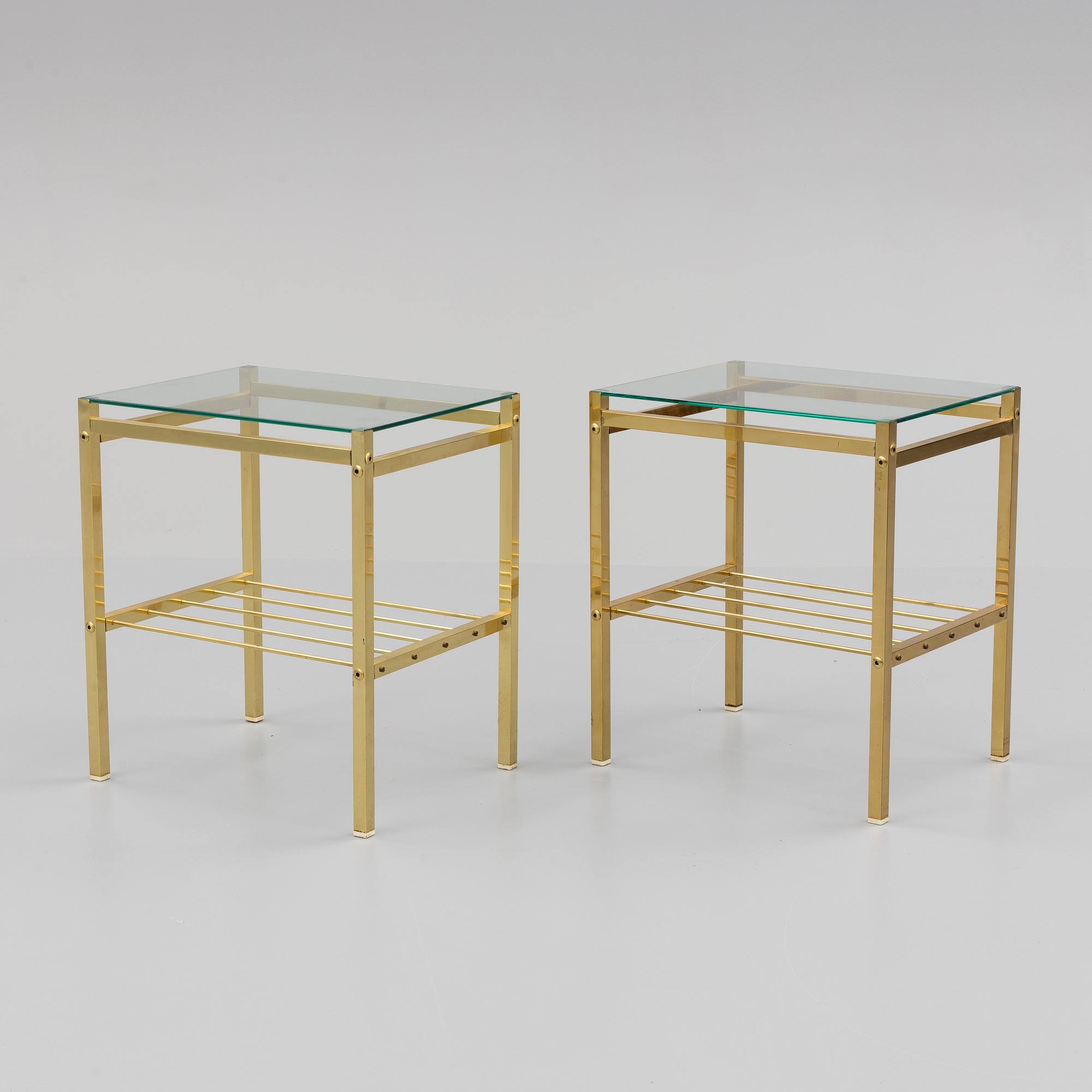 A pair of brass and glass tables, second half of the 20th century.