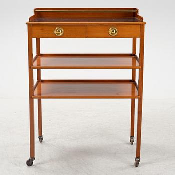 Josef Frank, a mahogany serving table/bar table, model 2227, Firma Svenskt Tenn, second half of the 20th century.