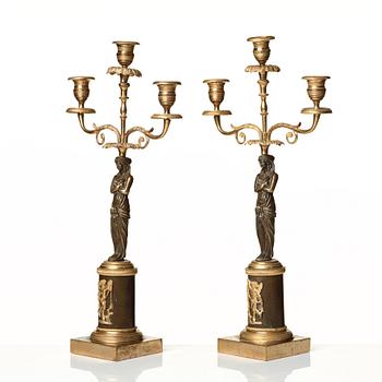 A pair of late Gustavian circa 1800 three-light candelabra.