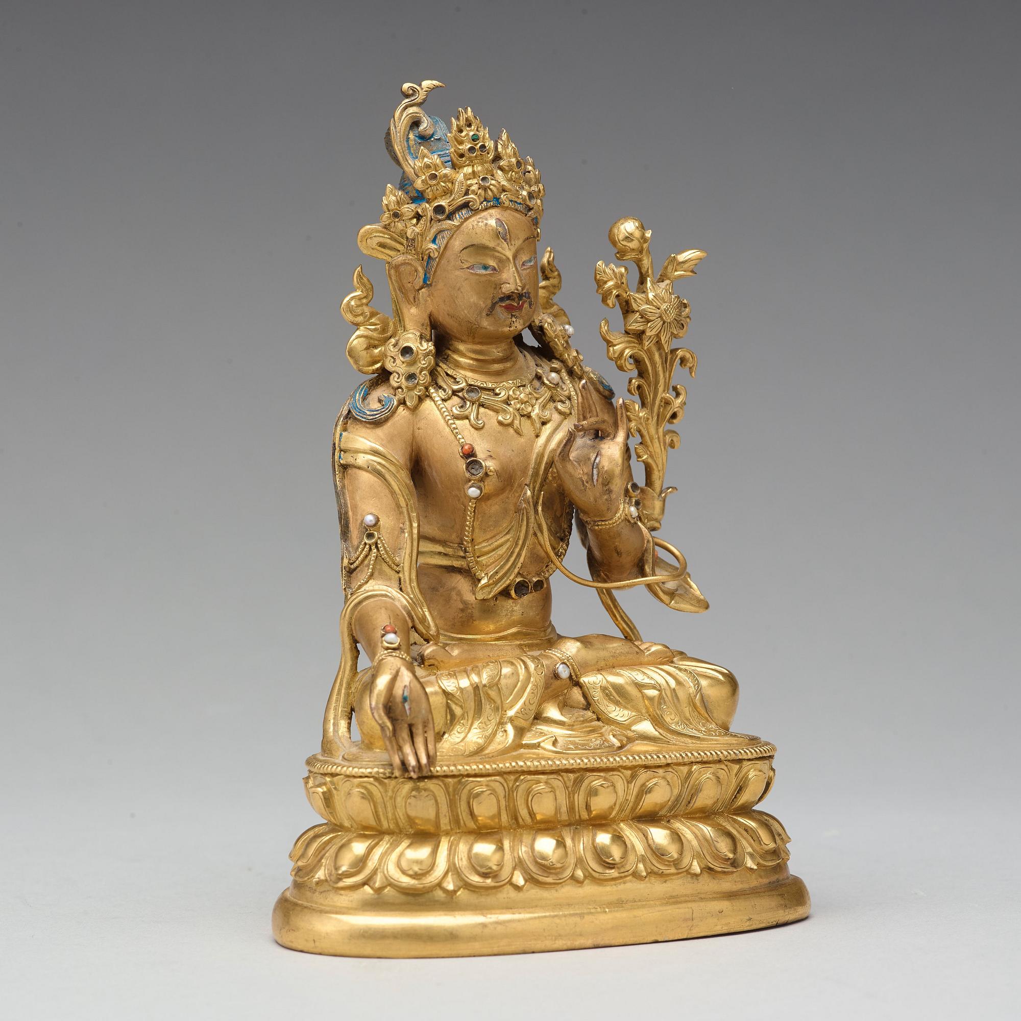 A gilt bronze figure of a White Tara, Tibetan-Chinese, 18th Century.