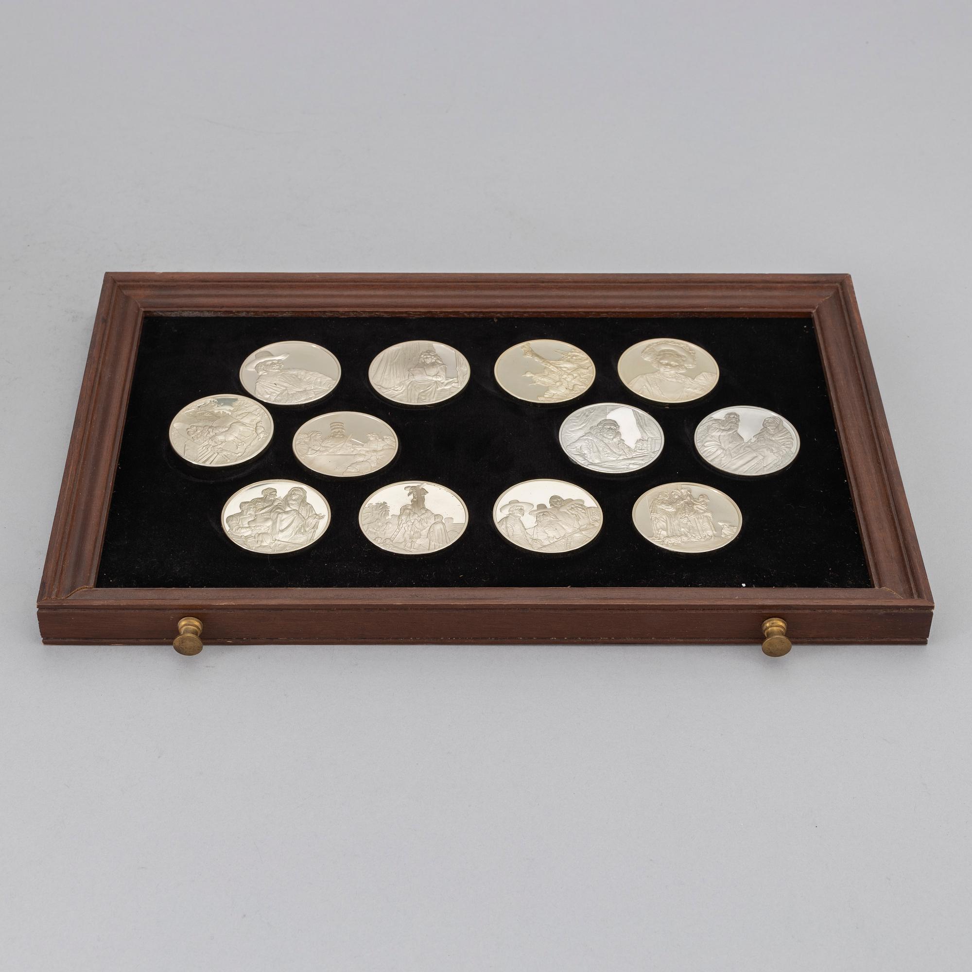 A set of 50 Sterling silver medals from Franklin Mint.