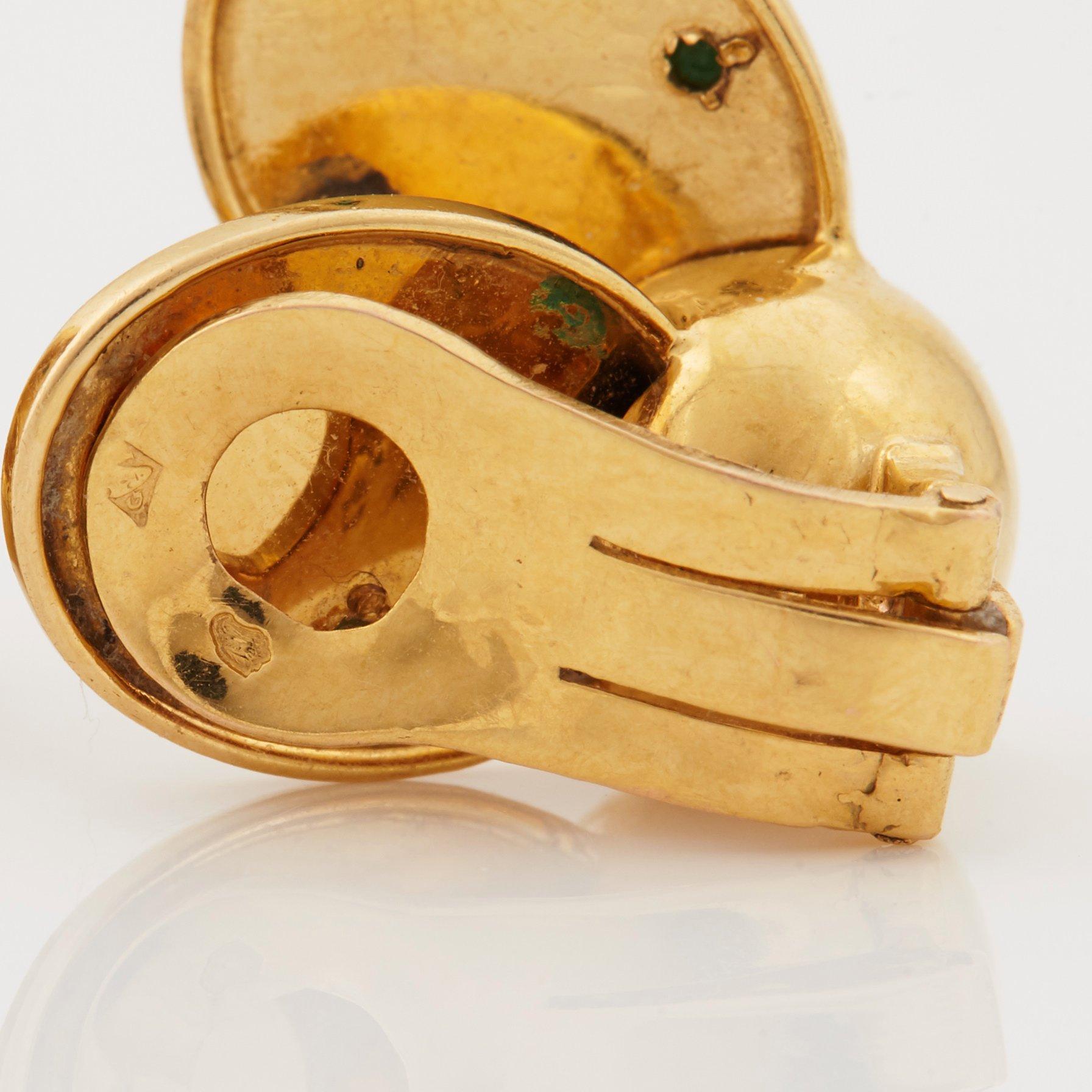 A pair of 1950/60's earrings in the shape of ladybirds set with cabochon cut turquoises, by Boucheron.