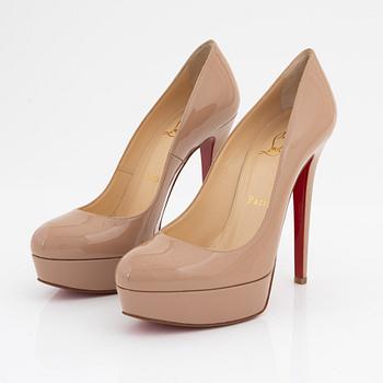Christian Louboutin, a pair of patent leather pumps, size 37.