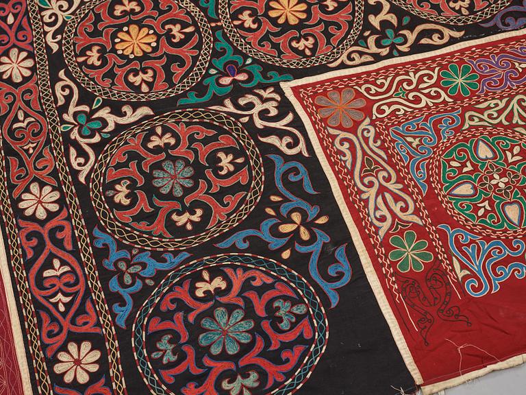 A Suzani textile, ca 247 x 128 cm.