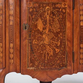 A pair of Louis XVI corner cupboards by Francois Gaspard Teunè (master in Paris from 1766), 18th century.