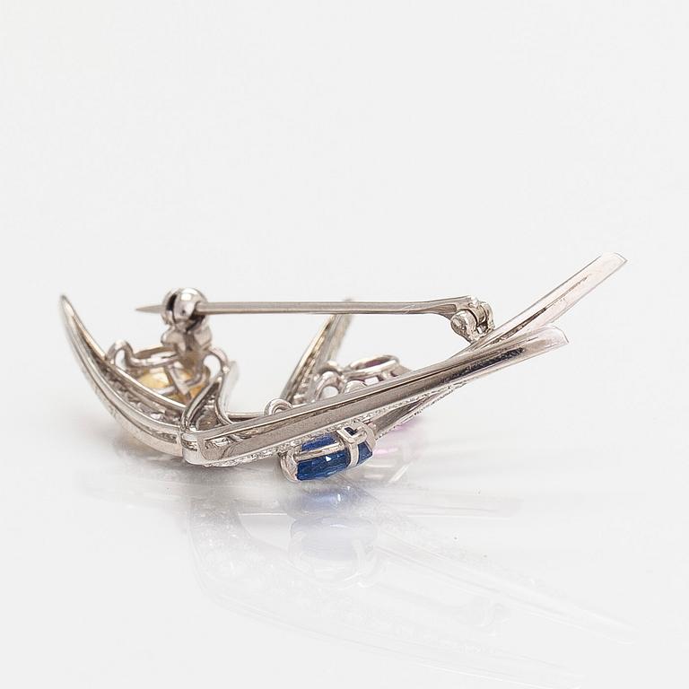 An 18K white gold brooch, with diamonds and sapphires. C F Carlman, Stockholm 1971.