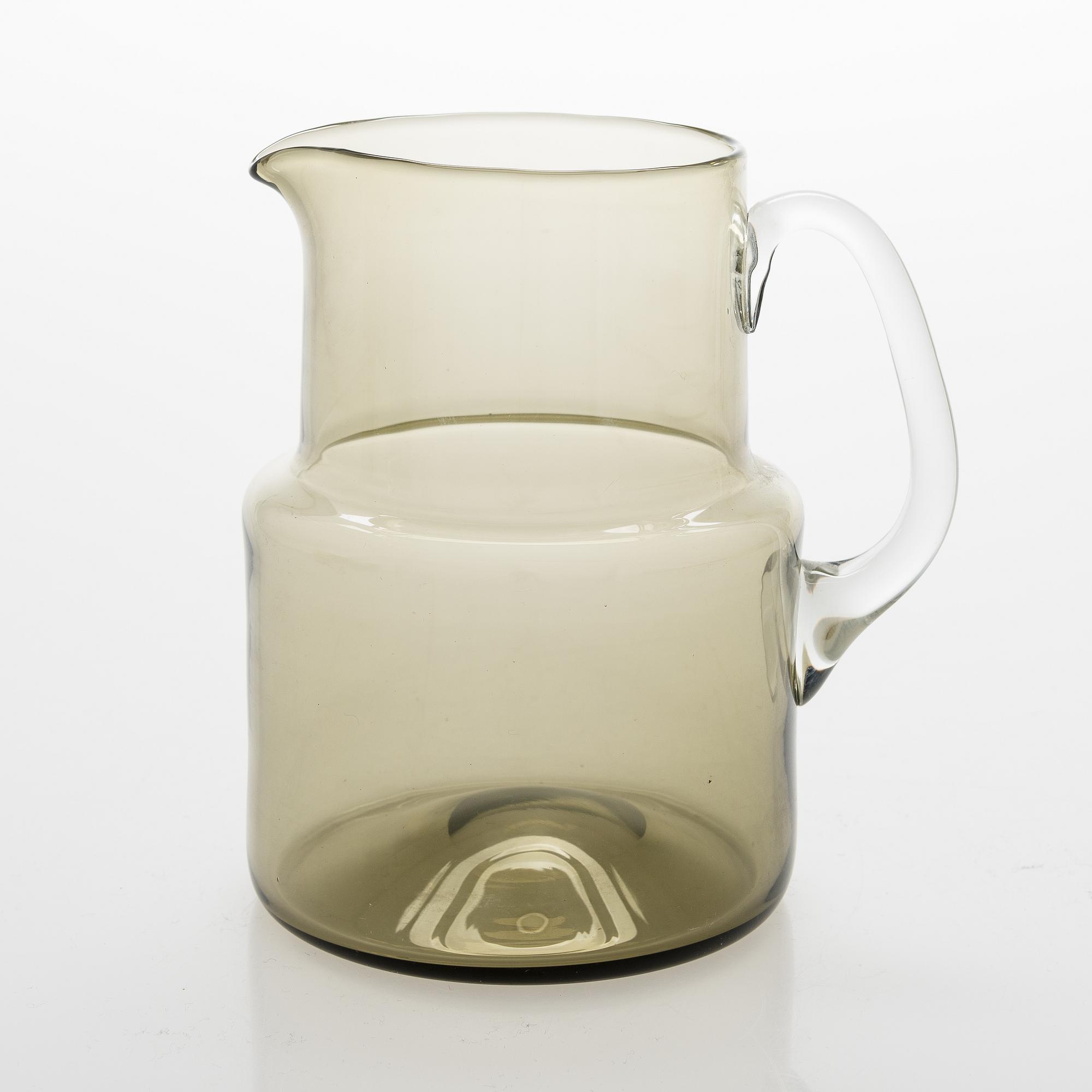Saara Hopea, A glass pitcher and six glasses in rattan basket, for Nuutajärvi. Designed year 1952.