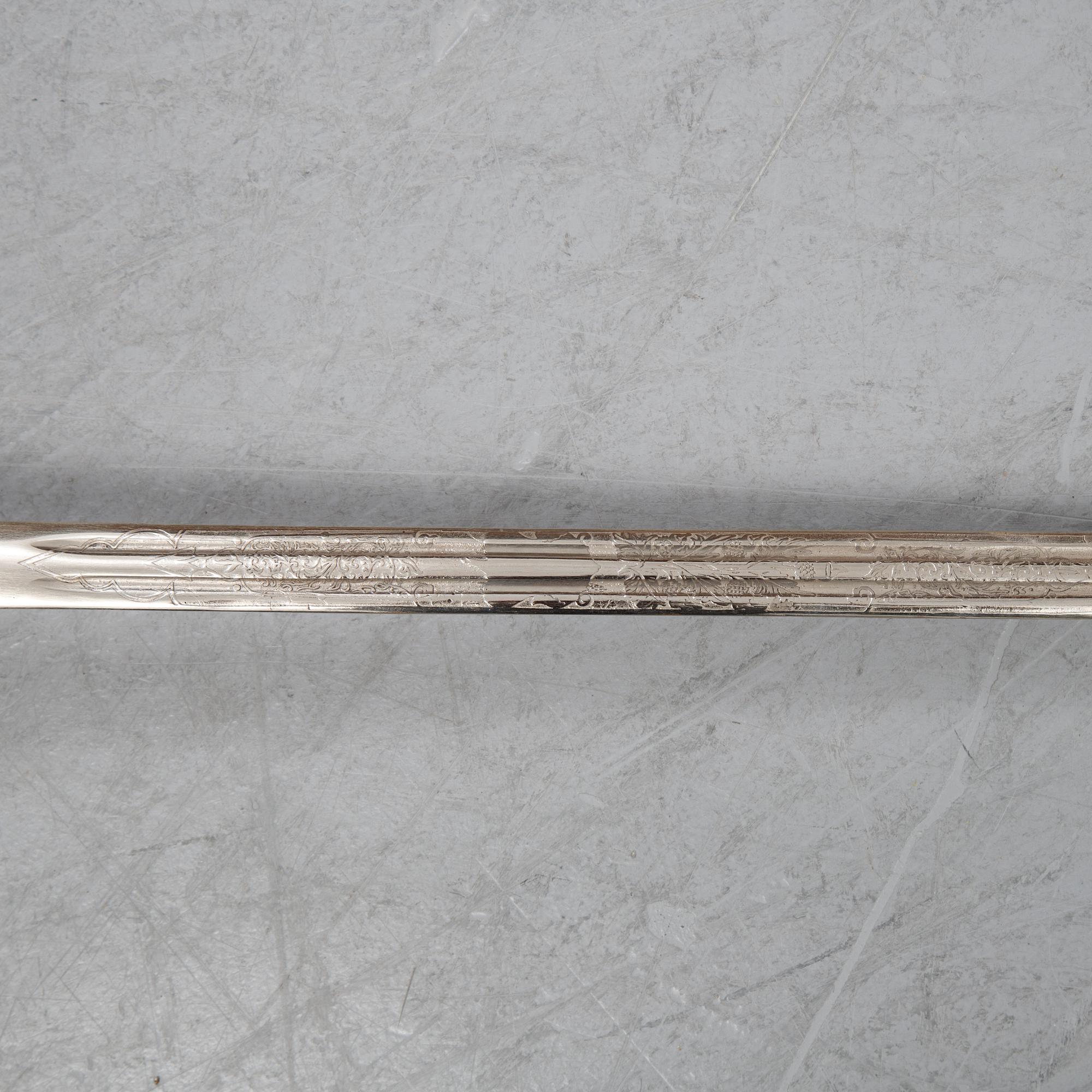 A Regulation Basket hilted broadsword for Highland officers, with scabbard, late 20th Century.