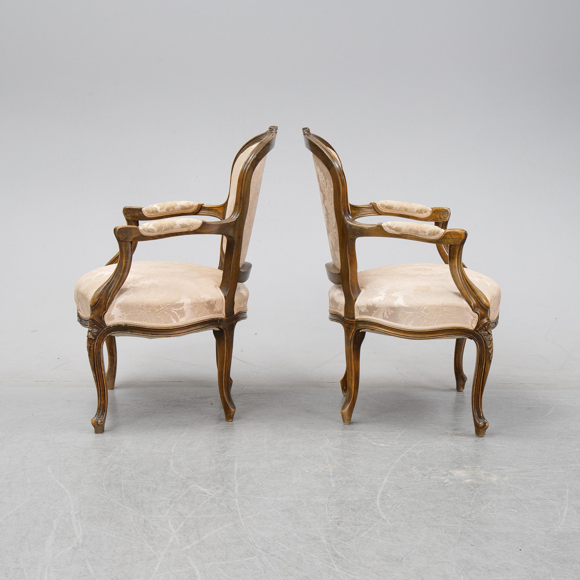 A pair of Louis XV-style arm chairs, 20th century.