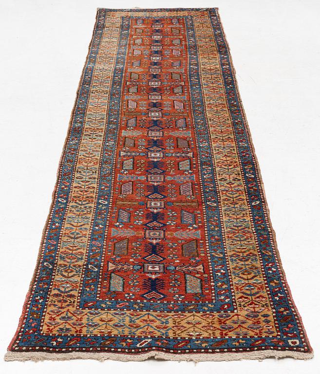 A Northwest Persian runner, c. 385 x 95 cm.