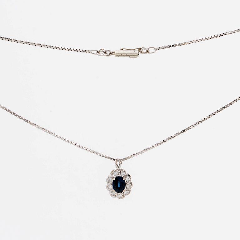 PENDANT and chain 18K whitegold 1 sapphire approx 6 x 4 mm and brilliant-cut diamonds approx 0,25 ct in total.