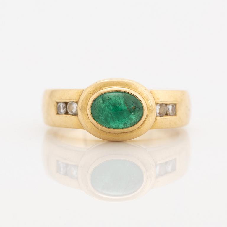 18K gold, cabochon cut emerald and brilliant cut diamond ring.