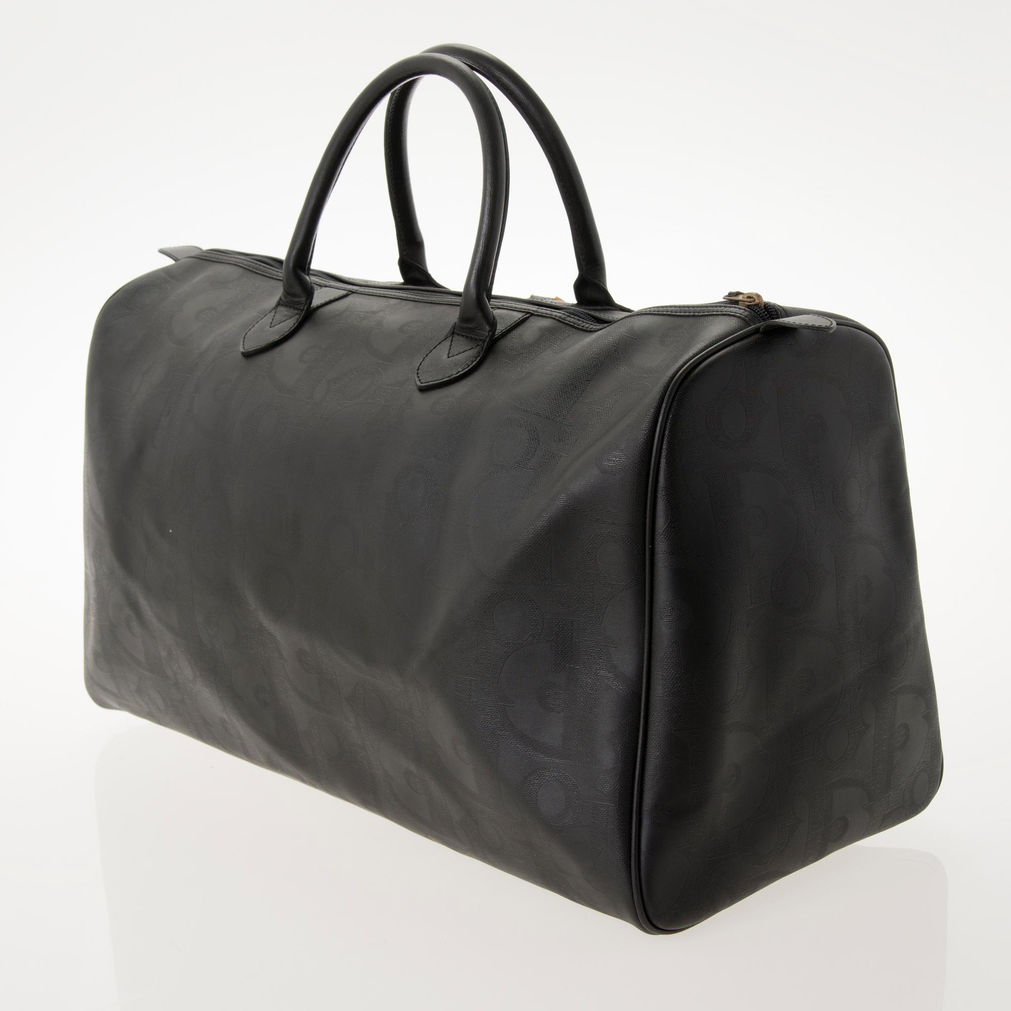 CHRISTIAN DIOR Black Monogram Coated Canvas Duffel Bag.