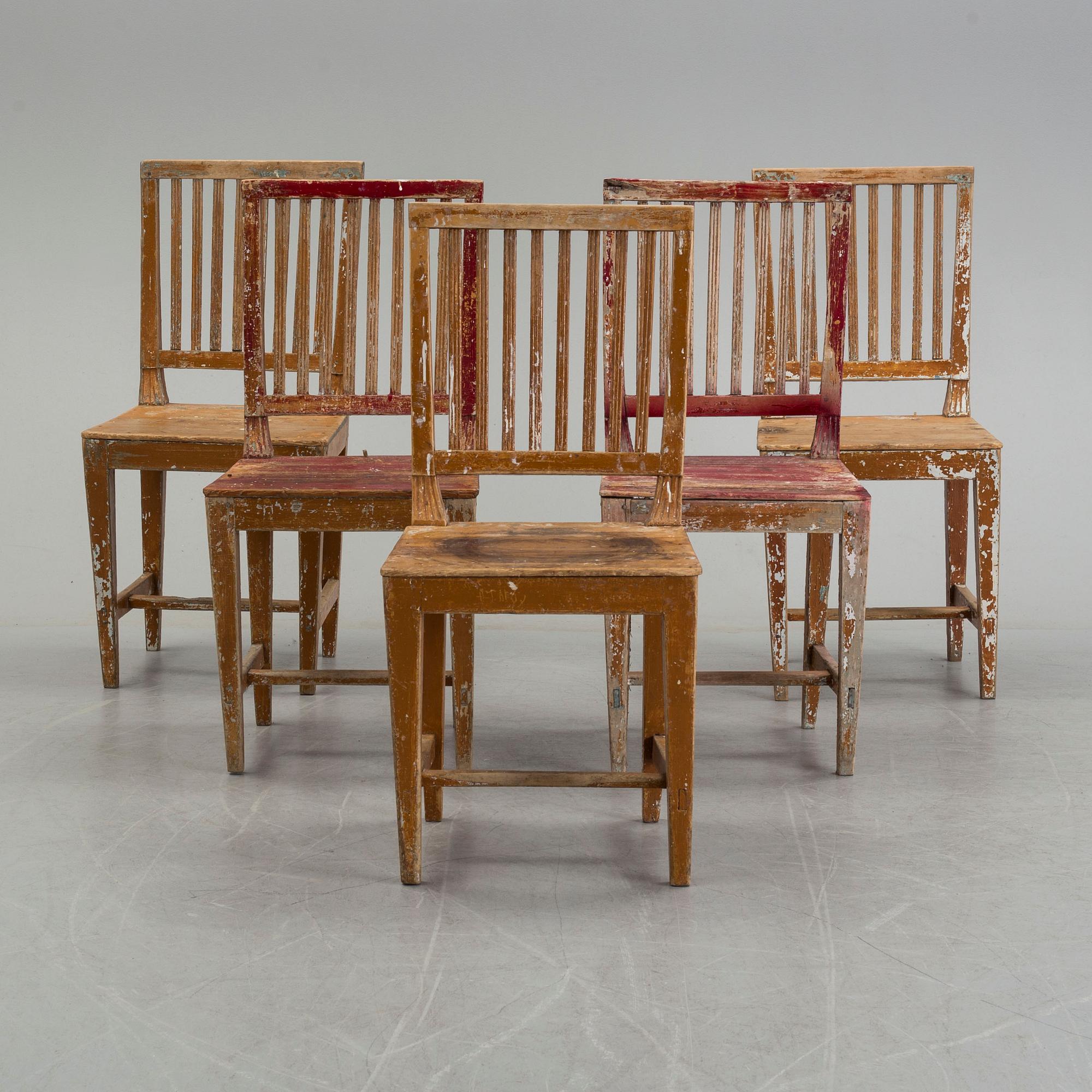 Five painted pine chairs, 19th Century.