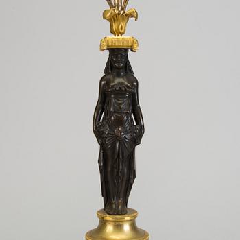 A pair of 1800s empire candelabras.