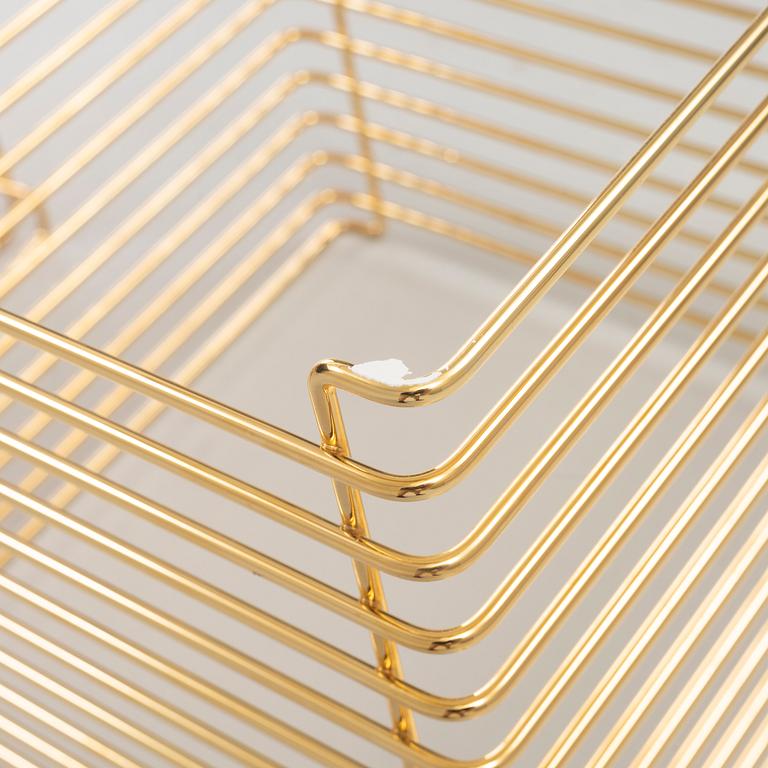 Verner Panton, a set of three 'Wire' shelves, Montana.