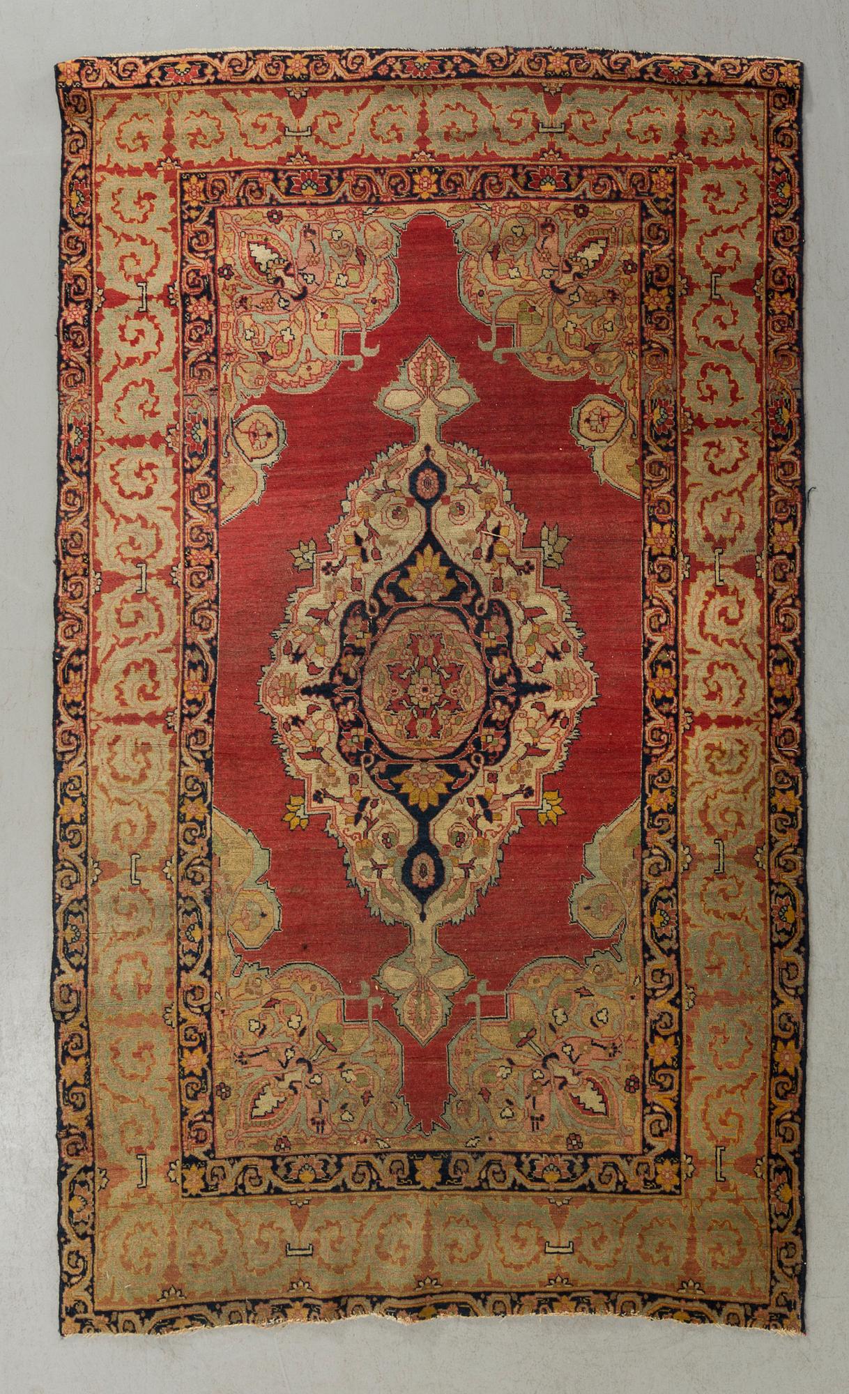 An antique second part of the 19th century Persian carpet ca 182 x112 cm.