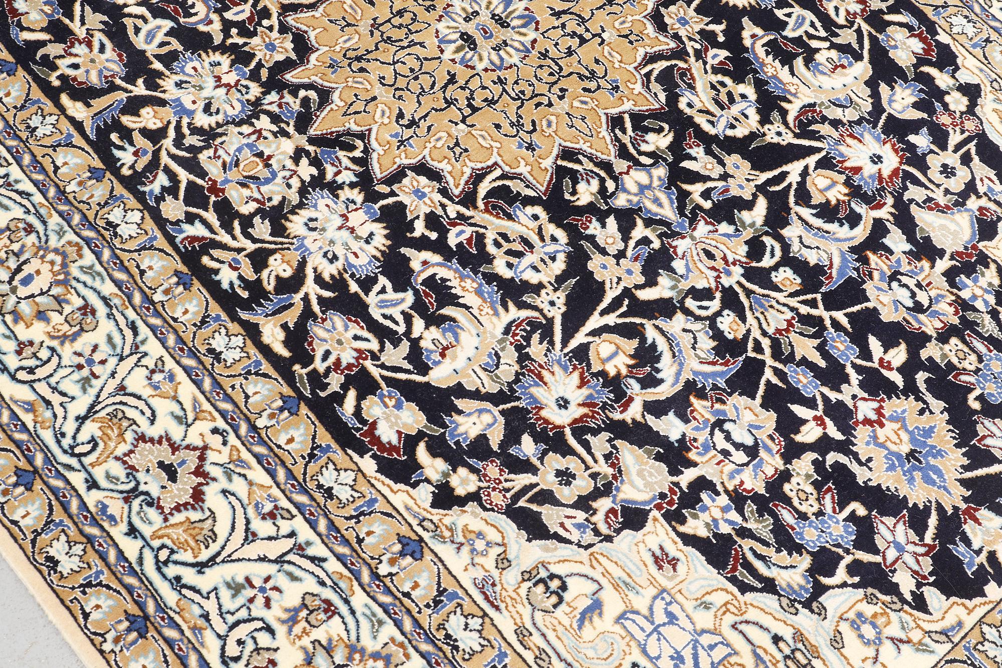 A carpet, Nain Part Silk, sk 9 LAA, ca 244 x 155 cm.