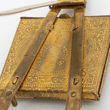 A gilt metal stamp holder, W. Avery & Son, Redditch, England, late 19th Century.