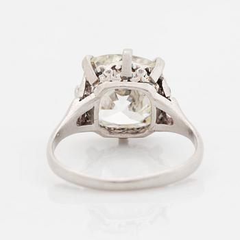 A platinum ring set with an old-cut diamond.