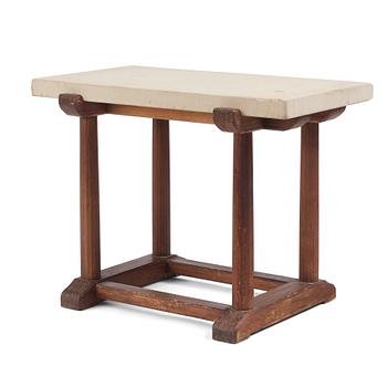 318. Axel Einar Hjorth, a stained pine "Sandhamn" table with a sandstone top, Nordiska Kompaniet, Sweden, 1931.