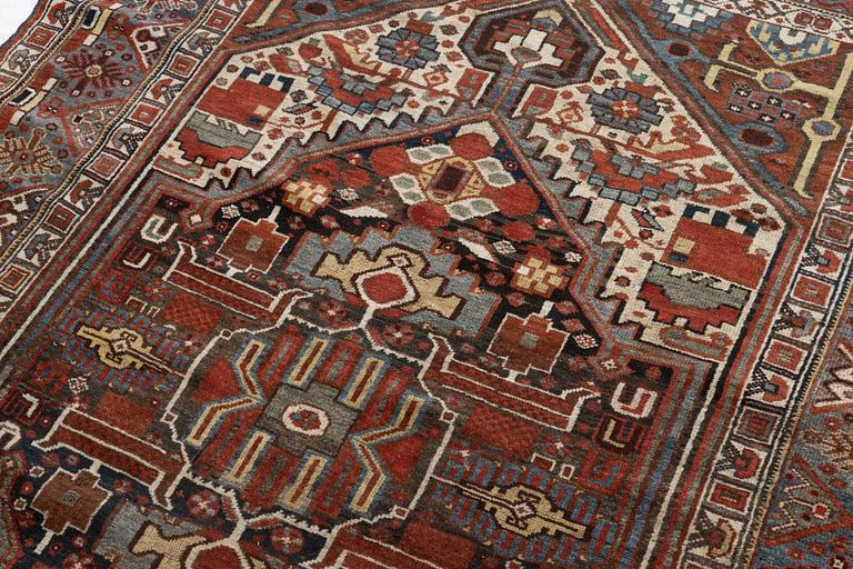 An antique Qashqai rug, southeastern Iran, c. 242 x 170 cm.