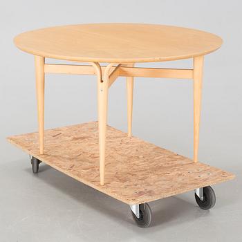 a coffee table from Firma Karl Mathsson, Värnamo, dated 1986.