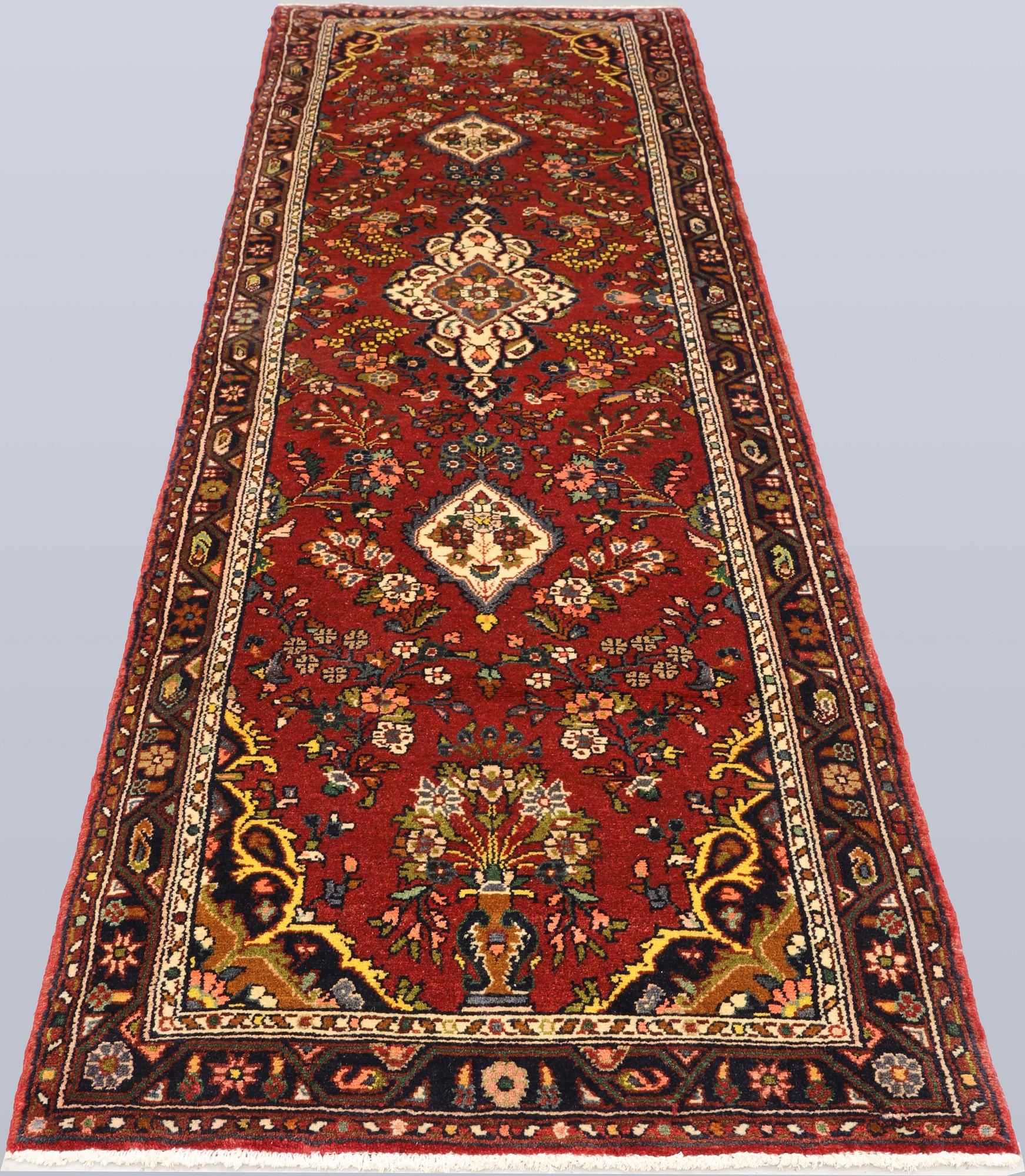 A Mehraban runner, approx. 324 x 89 cm.