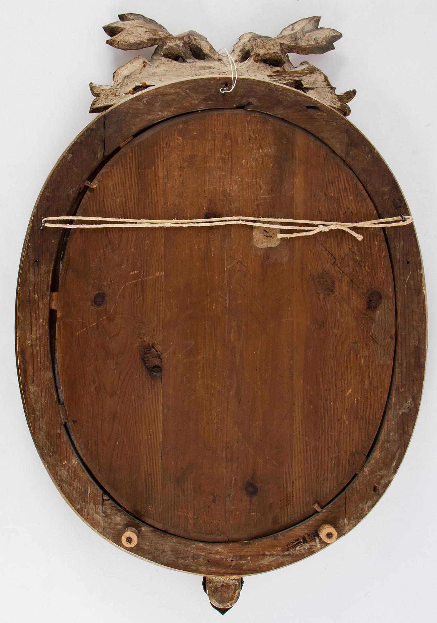 A Gustavian two-light girandole mirror, Stockholm, late 18th century.