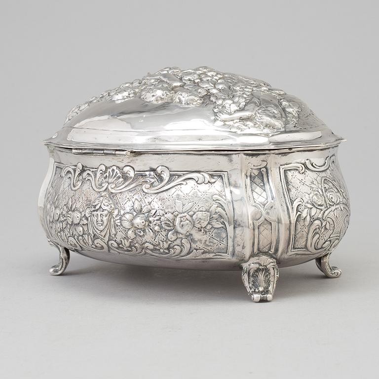 A silver sugar box, early 20th century.