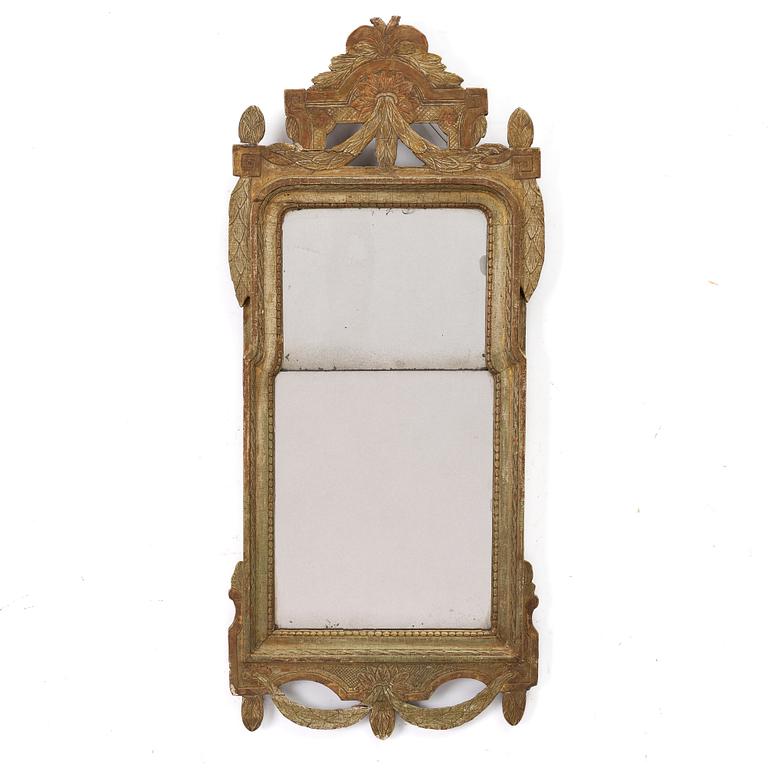 A Gustavian giltwood mirror, Stockholm, late 18th century.