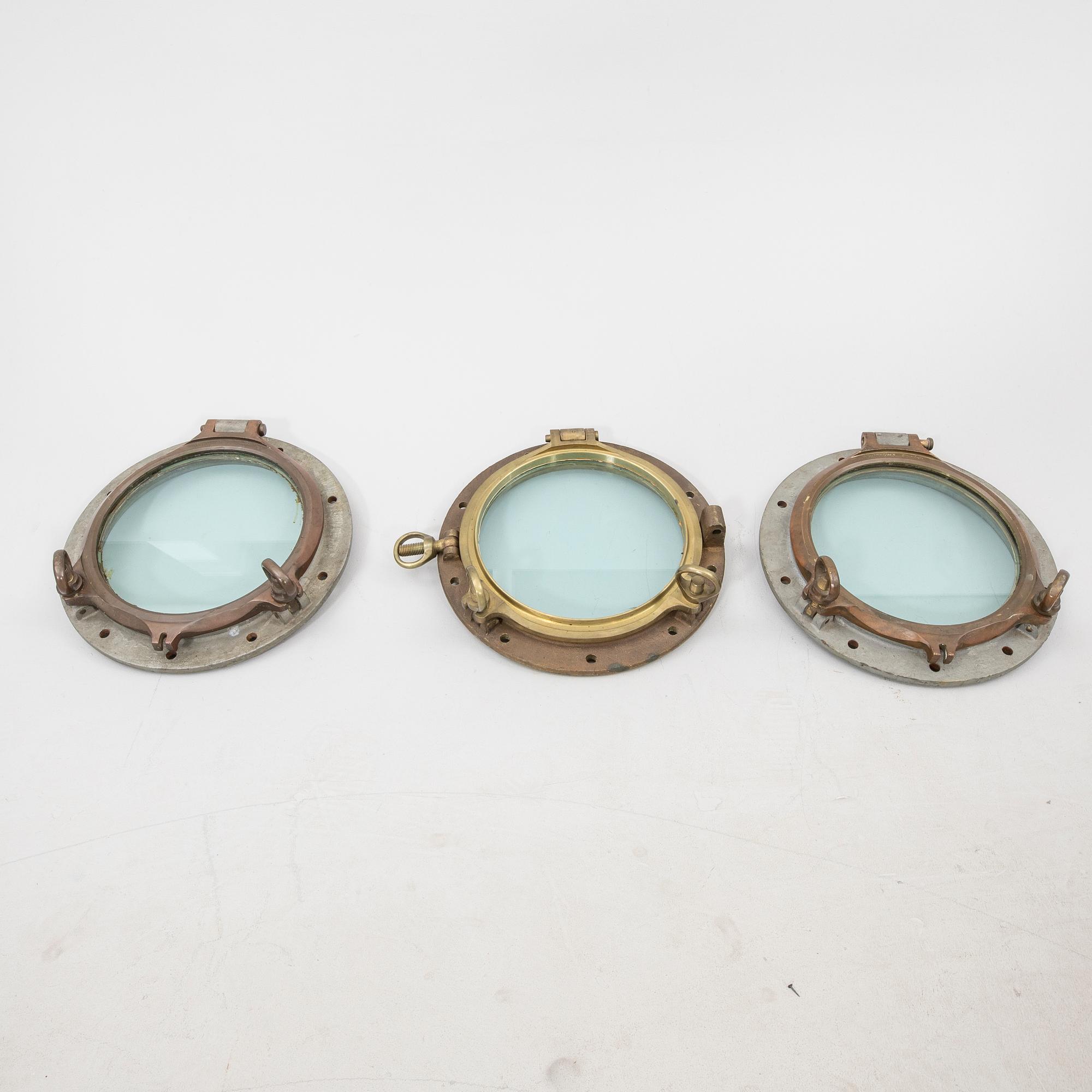 A set of three brass and metal ships windows possibly England 20th ...