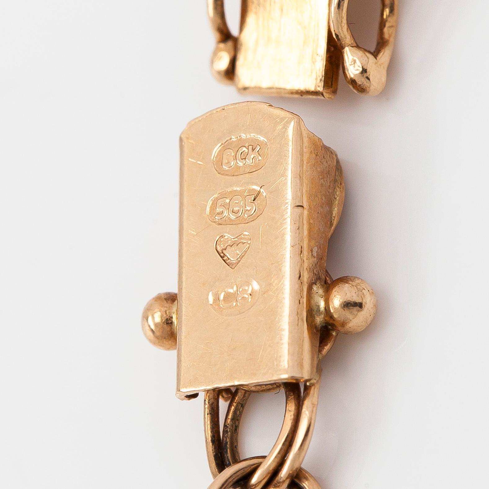 A 14K gold Bismarck necklace and bracelet.