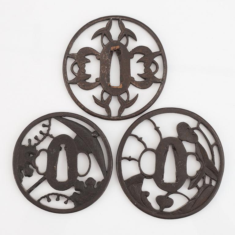 Three Japanese iron tsubas, probably 18th Century.