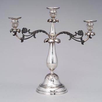 A THREE LIGHT SILVER CANDELABRA, Johan Lindroos, Kristinestad 1852, weight 898 g.