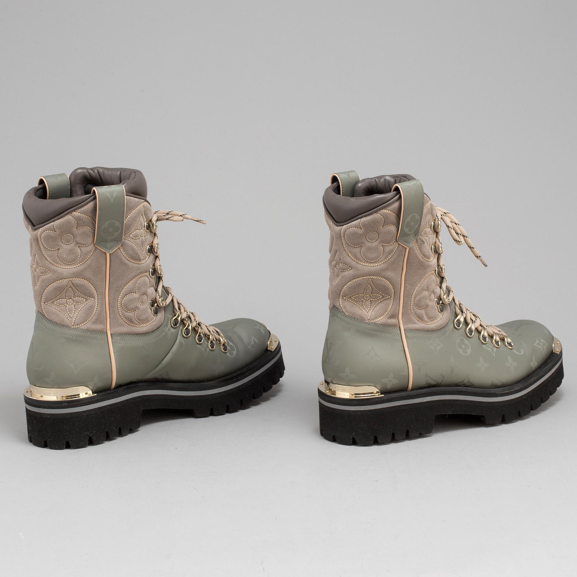 LOUIS VUITTON a pair of suede boots size 8 Fashion show 2018 2019. Bukowskis