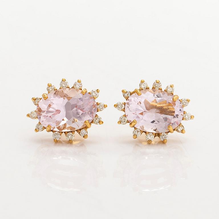 A pair of 14K gold earrings with faceted morganites and brilliant-cut diamonds.