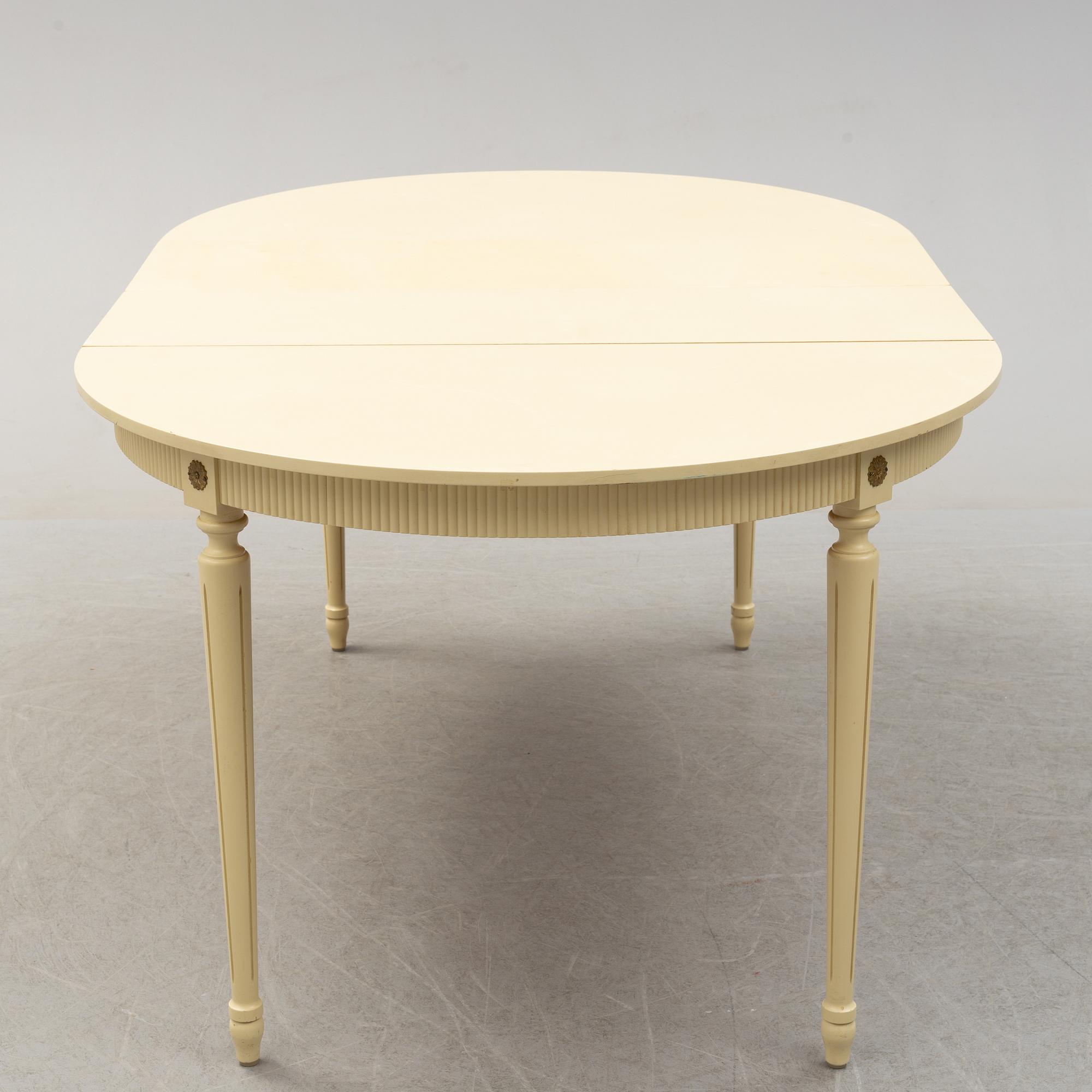 A set of six chairs and a dining table, gustavian style, late 20th century.