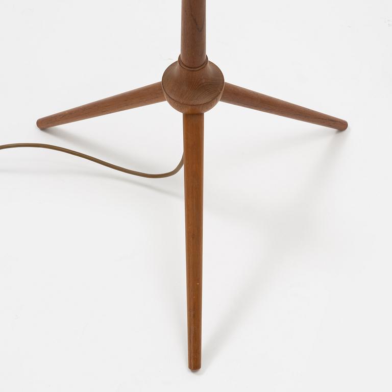 A pair of teak floor lamps, mid 20th century.
