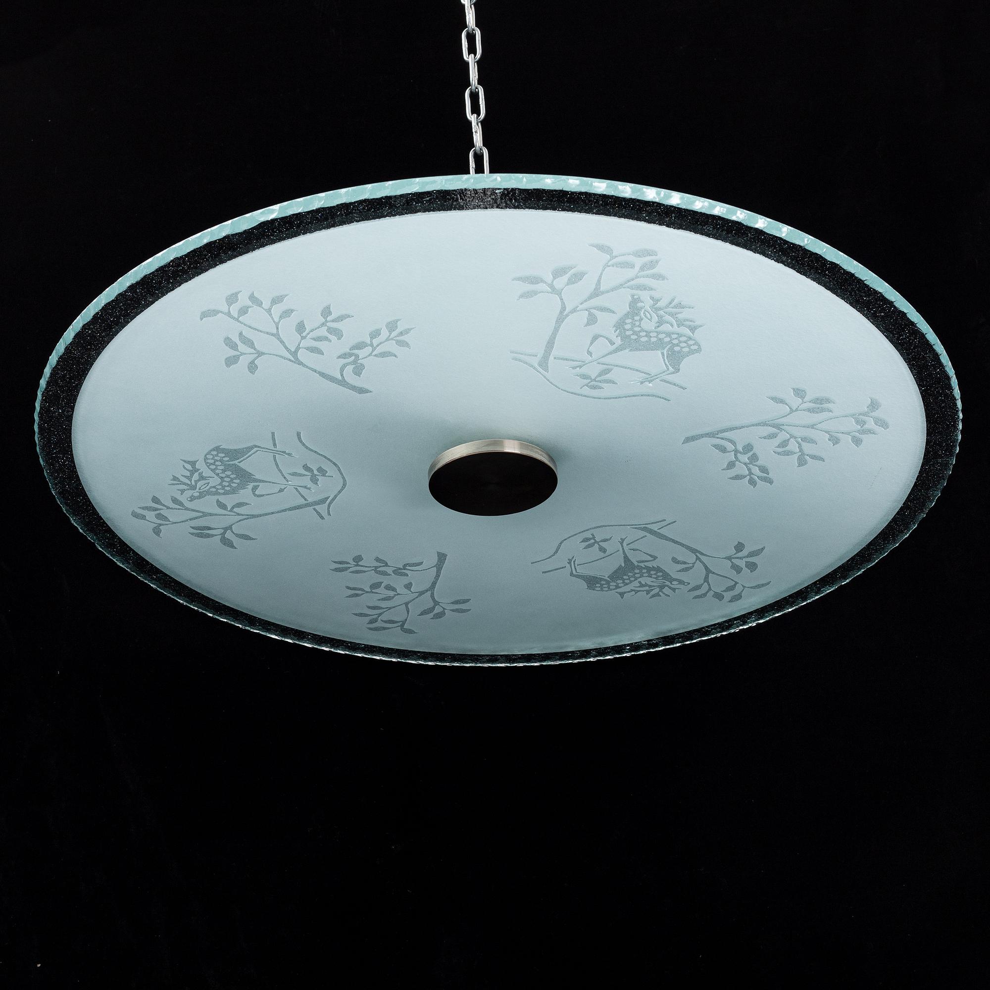 A 1940's Swedish Modern ceiling lamp.