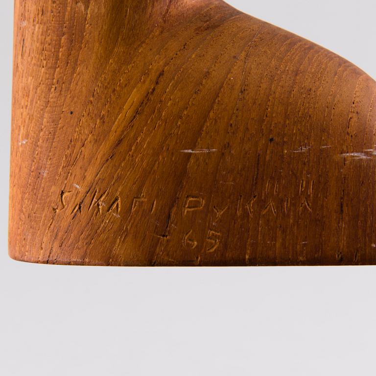 SAKARI PYKÄLÄ, a wooden sculpture, signed and dated -65.