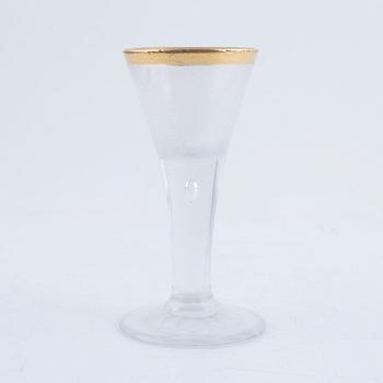 A presumably German engraved and gilt rococo glass, mid 18th century.