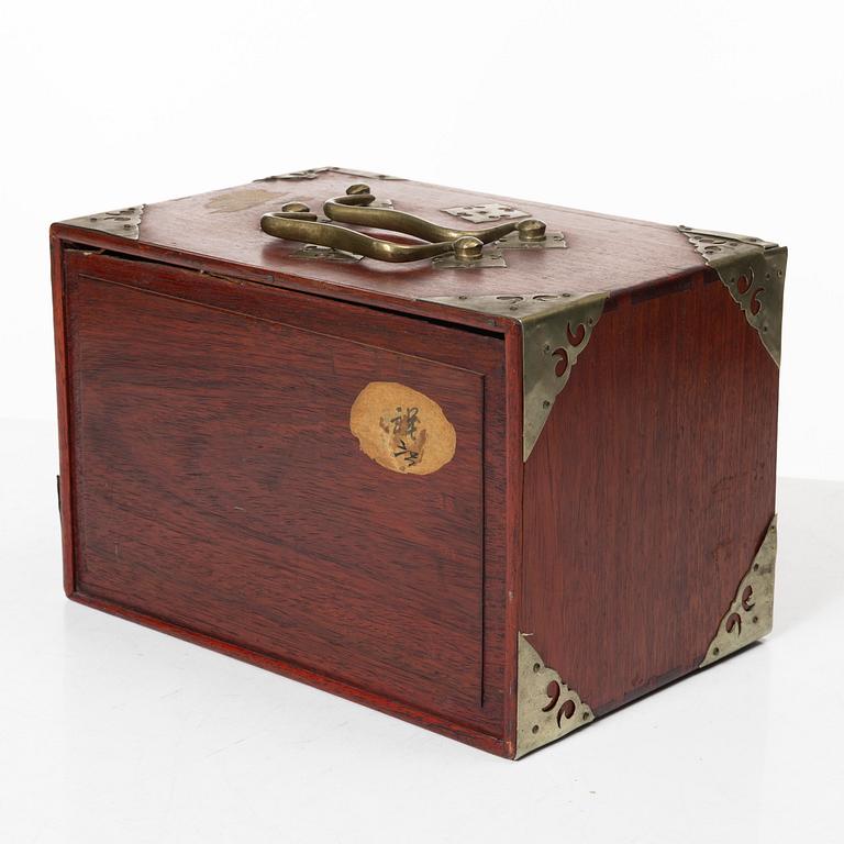 A Mahjong game in a hardwood box, China, first half of the 20th century.