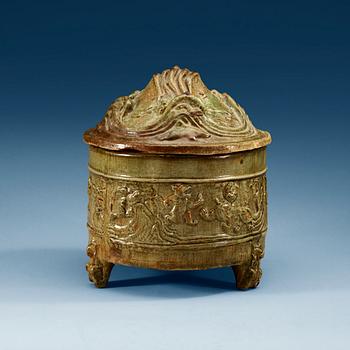 A green glazed tripod censer with cover, Han dynasty (206 BC - 220 AD).