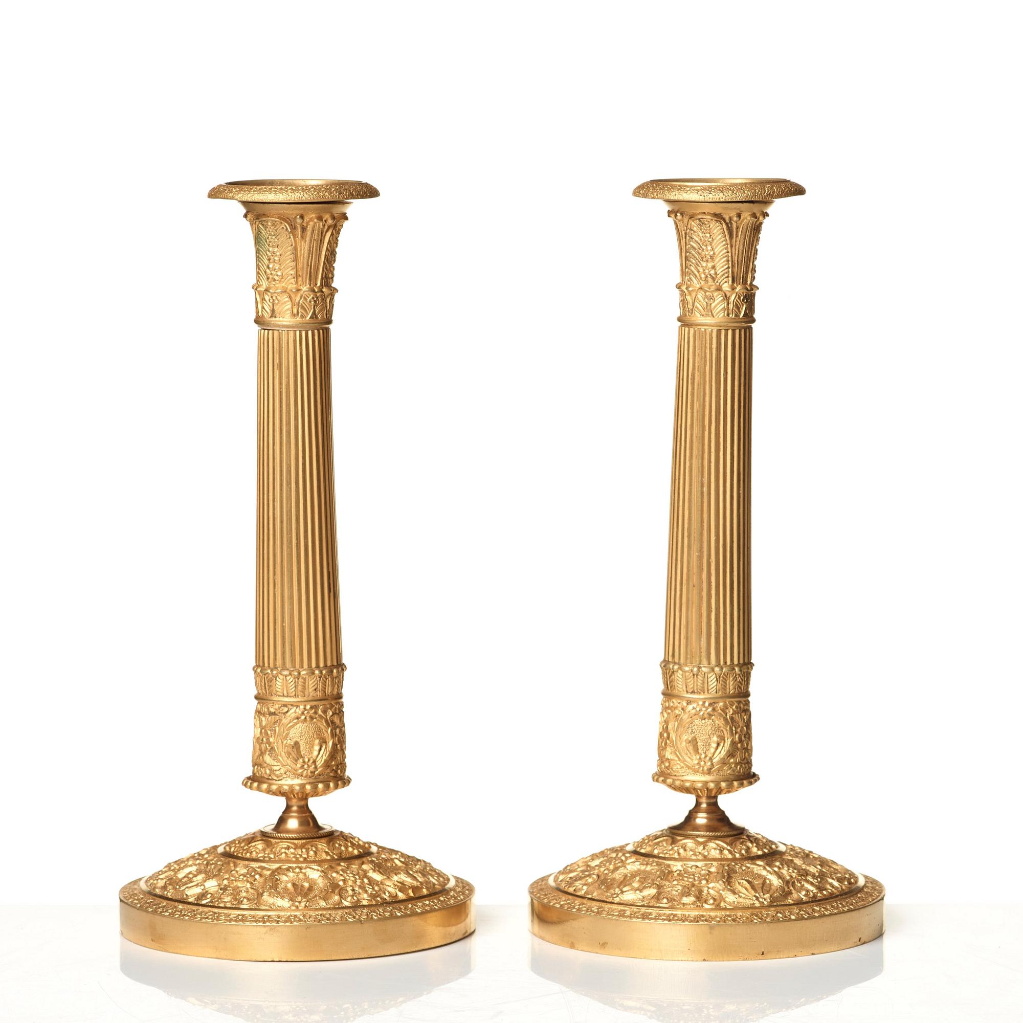 A pair of Empire candlesticks.