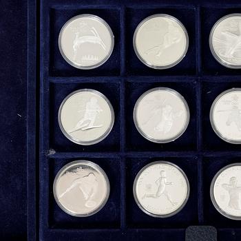 Twelve commemorative sterling silver coins, Olympic Games, Calgary and Seoul, 1988.