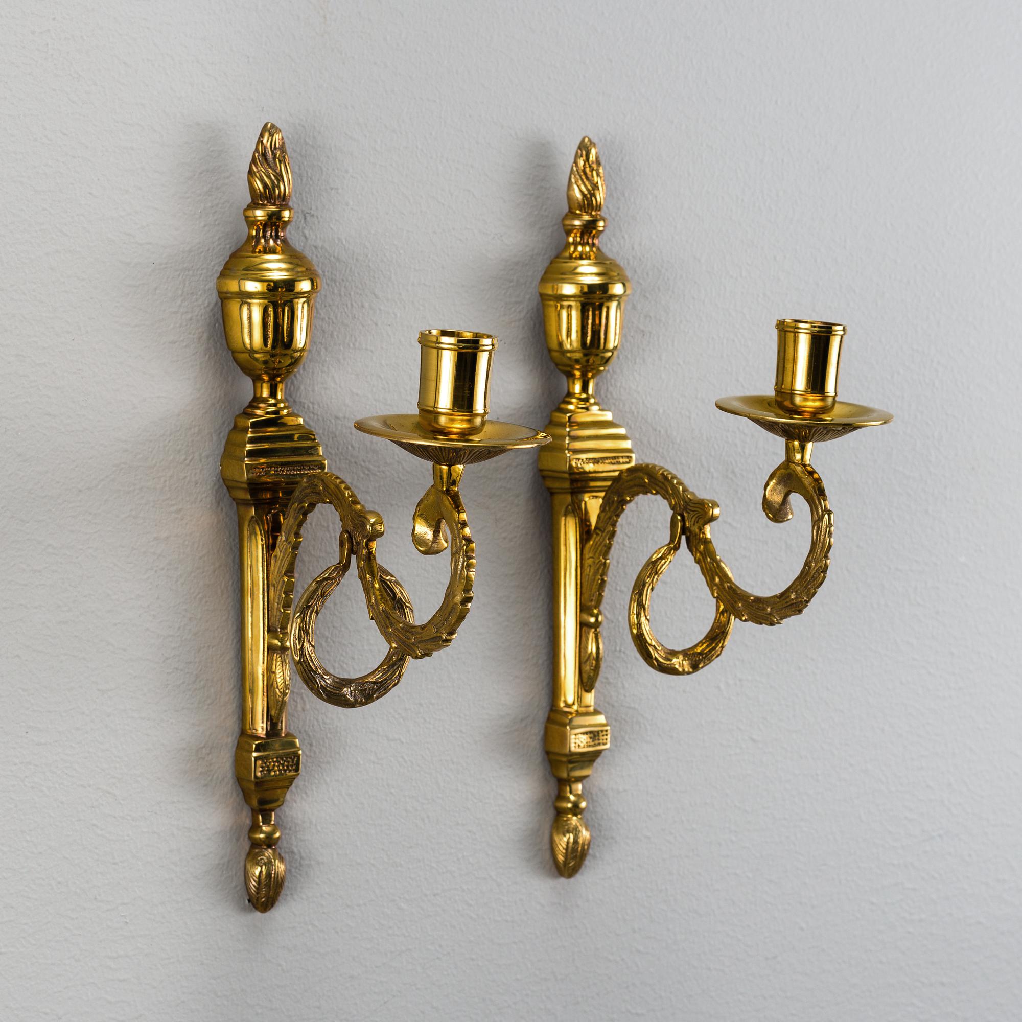 A pair of brass 'Törne' wall sconce, Ikeas 18th century Swedish Furniture series.