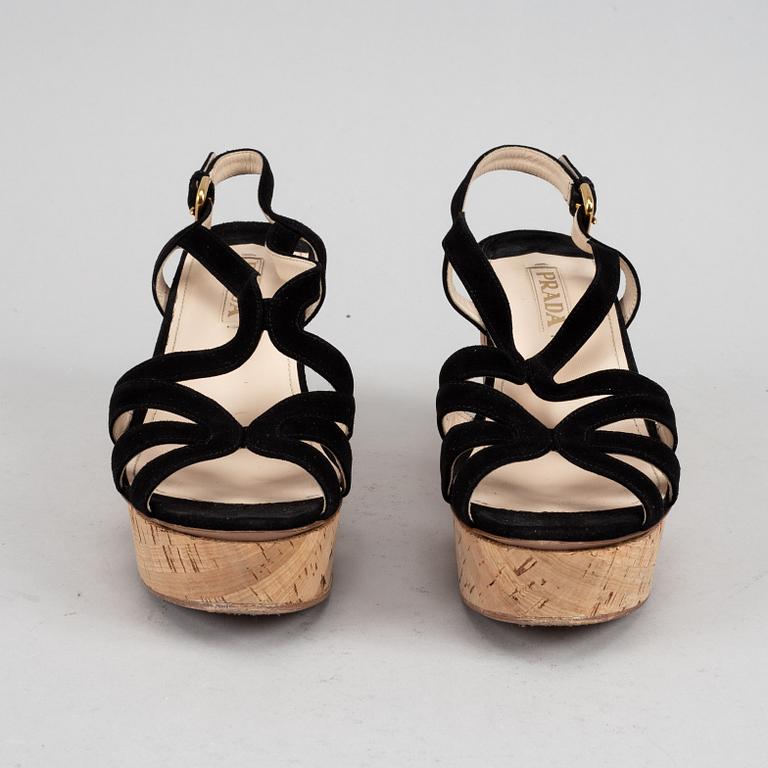 Prada, a pair of black suede wedge sandals, size 39½.