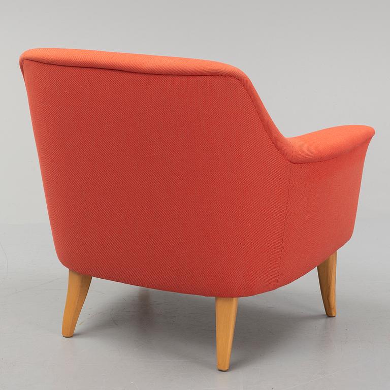 A late 20th century easy chair.